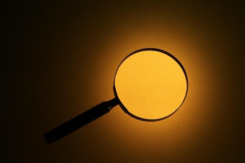 magnifying-glass-699777_640 Magnifying glass highlighting details on financial documents, symbolising AML/CTF scrutiny.